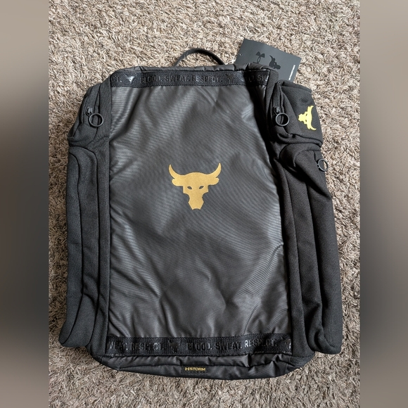 NWT Under Armour Storm Project Rock Black/Metallic Gold 39L Duffle Backpack - Picture 1 of 7